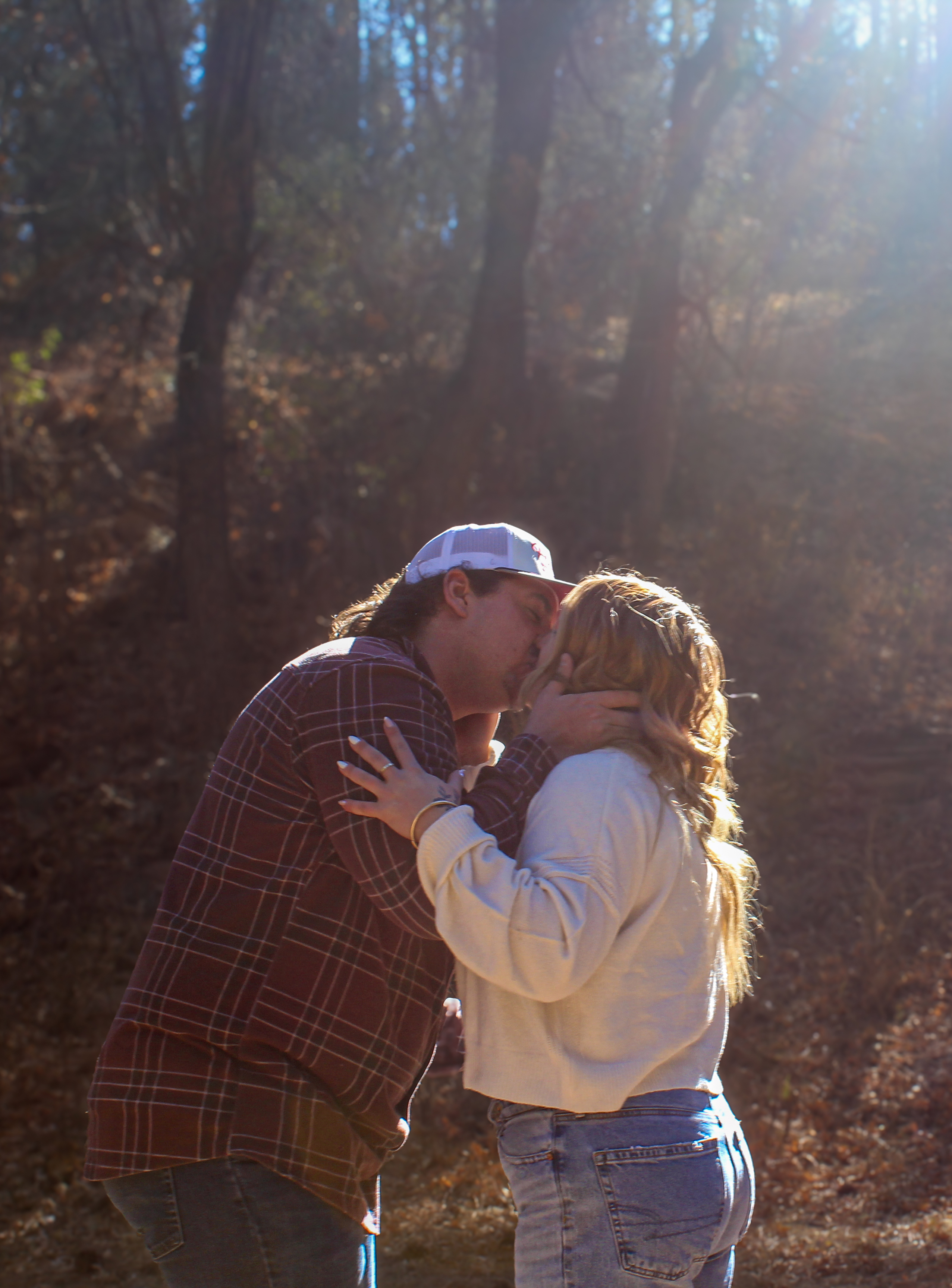 Collin and Danyelle kissing after proposal